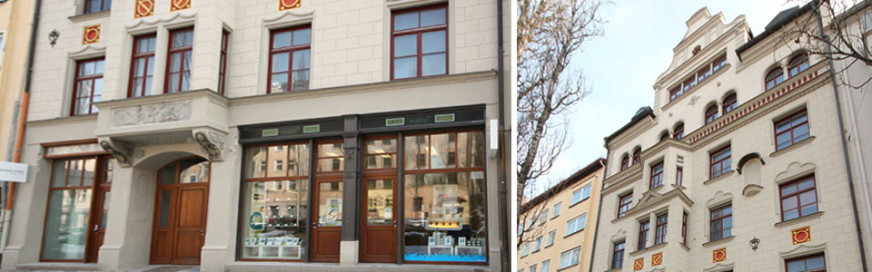 wiederhergestellte Ladenzeile / oberer Teil der wiederhergestellten Fassade – Sanierung denkmalgeschütztes Mehrfamilienhaus in München-Sendling
